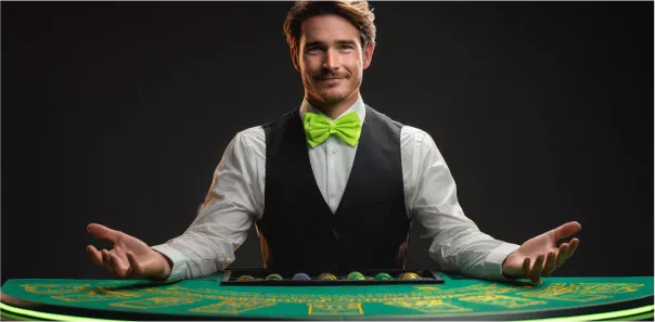 Krupier kasynowy przy stole WinWin